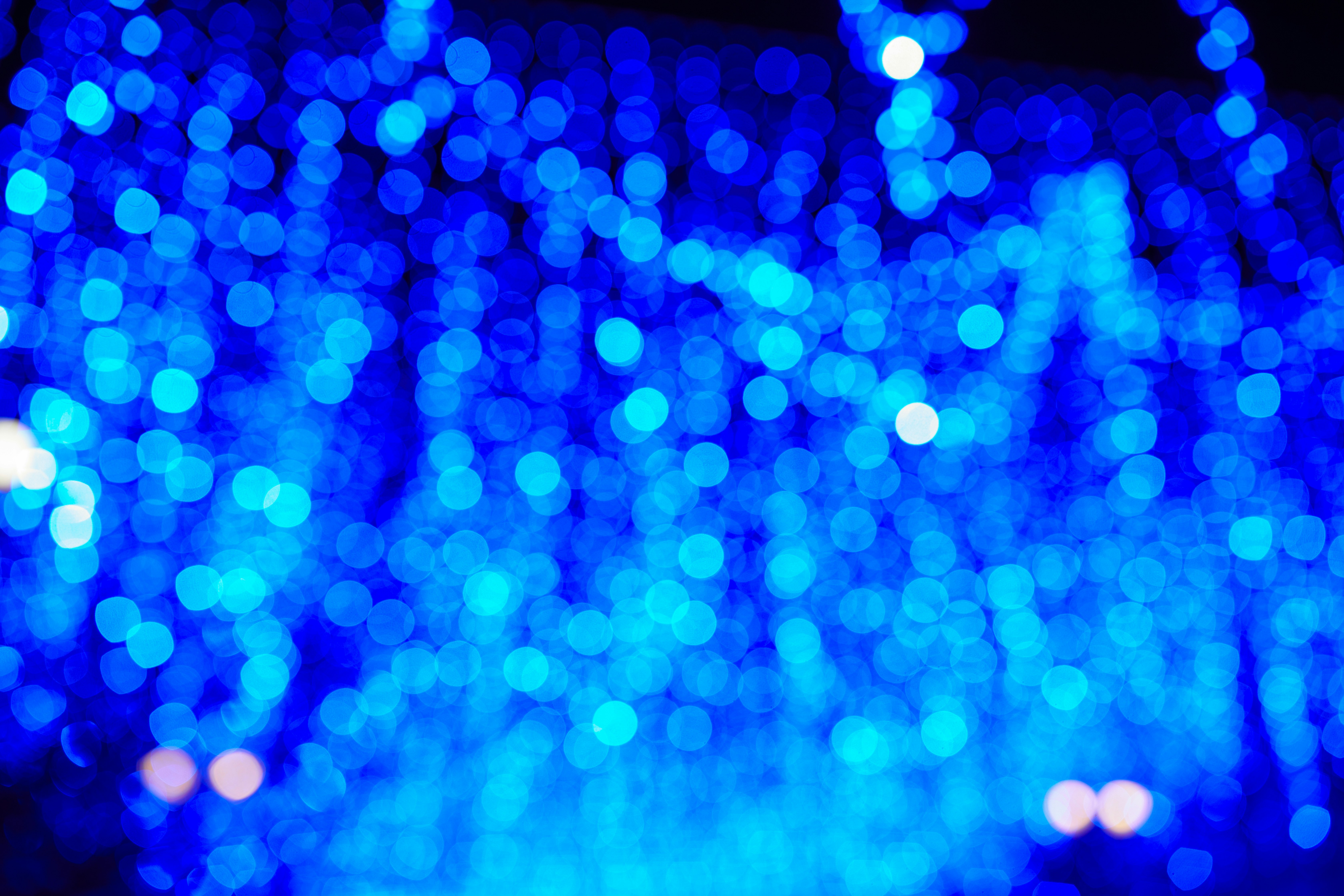 blue light bokeh on blue background